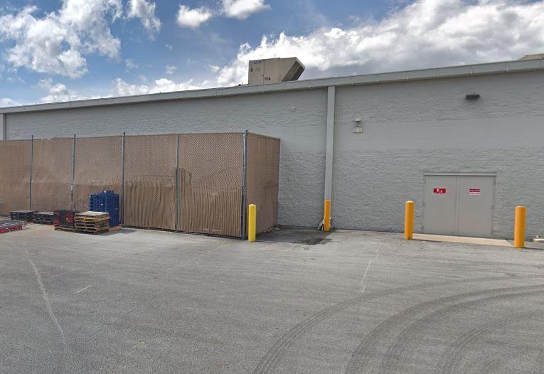 Dumpster Enclosure Behind Store